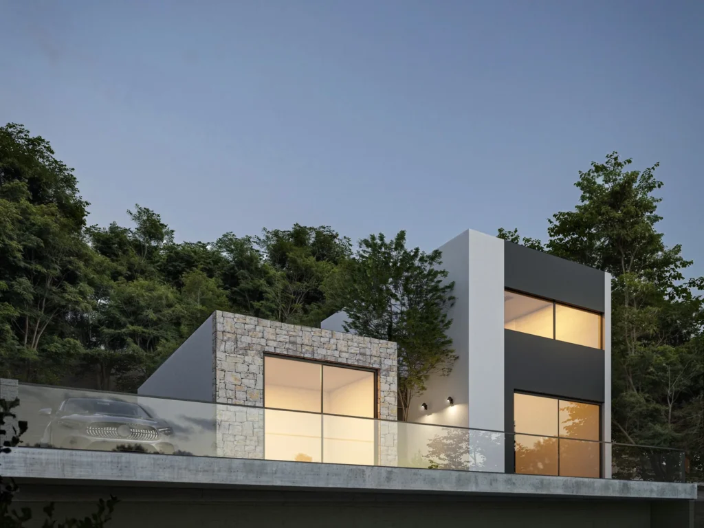 Casa Kairos al anochecer, vista lateral